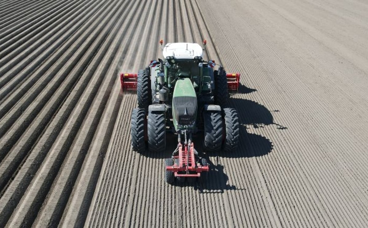 Tractor prepares neatly ridged fields